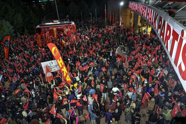 Members of the Republican People's Party (CHP) gather in front of the party headquarters during a protest against allegations of vote buying at the CHP congress in November 2023, in Ankara, on May 21, 2026.