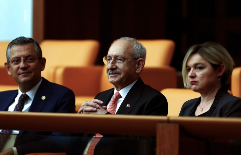 Turkish CHP party leader and Nation Alliance's presidential candidate Kemal Kilicdaroglu, center, joins legislators elected to the Grand National Assembly of Turkey in the May 14 parliamentary elections, attend their first parliamentary session to take the oath, in Ankara, Turkey, Friday, June 2, 2023. Turkish President Recep Tayyip Erdogan, who won a runoff presidential vote on May 28, formally starts his third presidential term following a ceremony on Saturday. (AP Photo/Ali Unal)